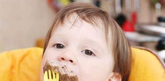 baby eating burger